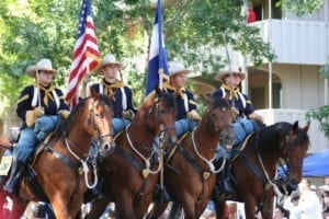 Greeley Stampede Parade Horses Flags