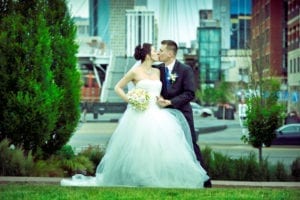 Married In Denver Colorado Wedding Couple Kiss Downtown