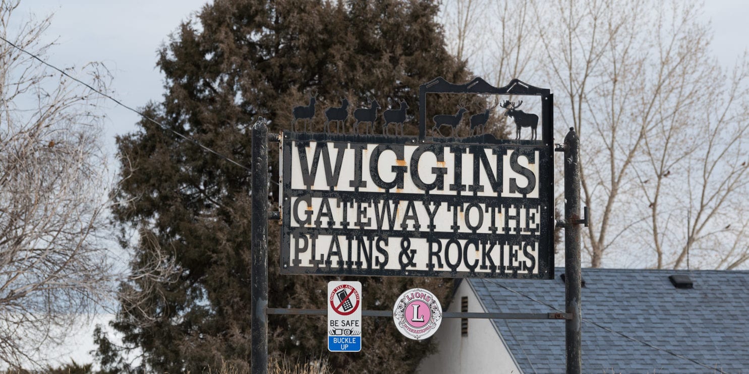 image of entrance to town of Wiggins, CO