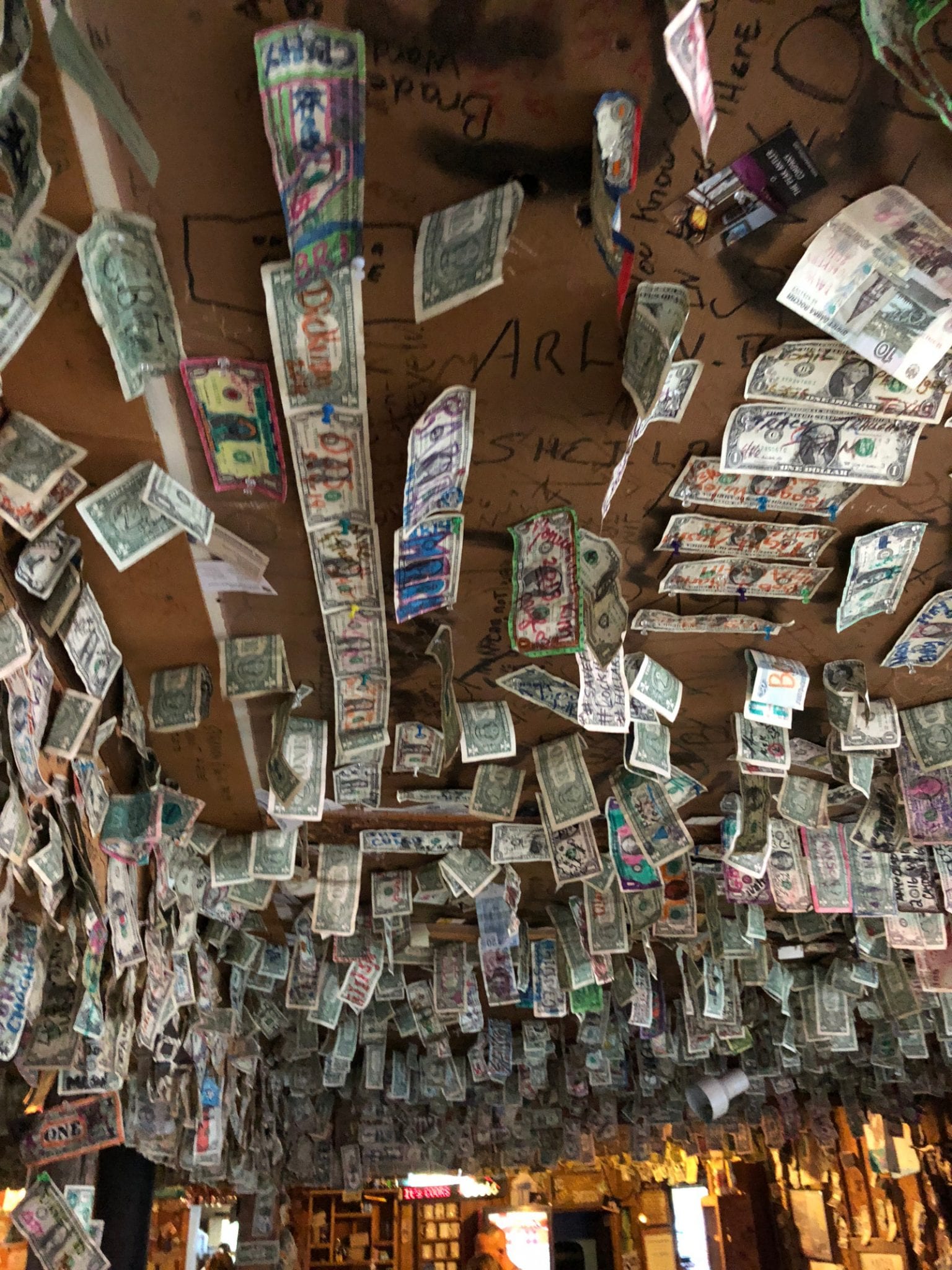 Bucksnort Saloon Dollar Bills on Ceiling