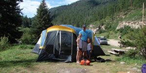 Camping with Kids Checklist Family at Campsite Rocky Mountains