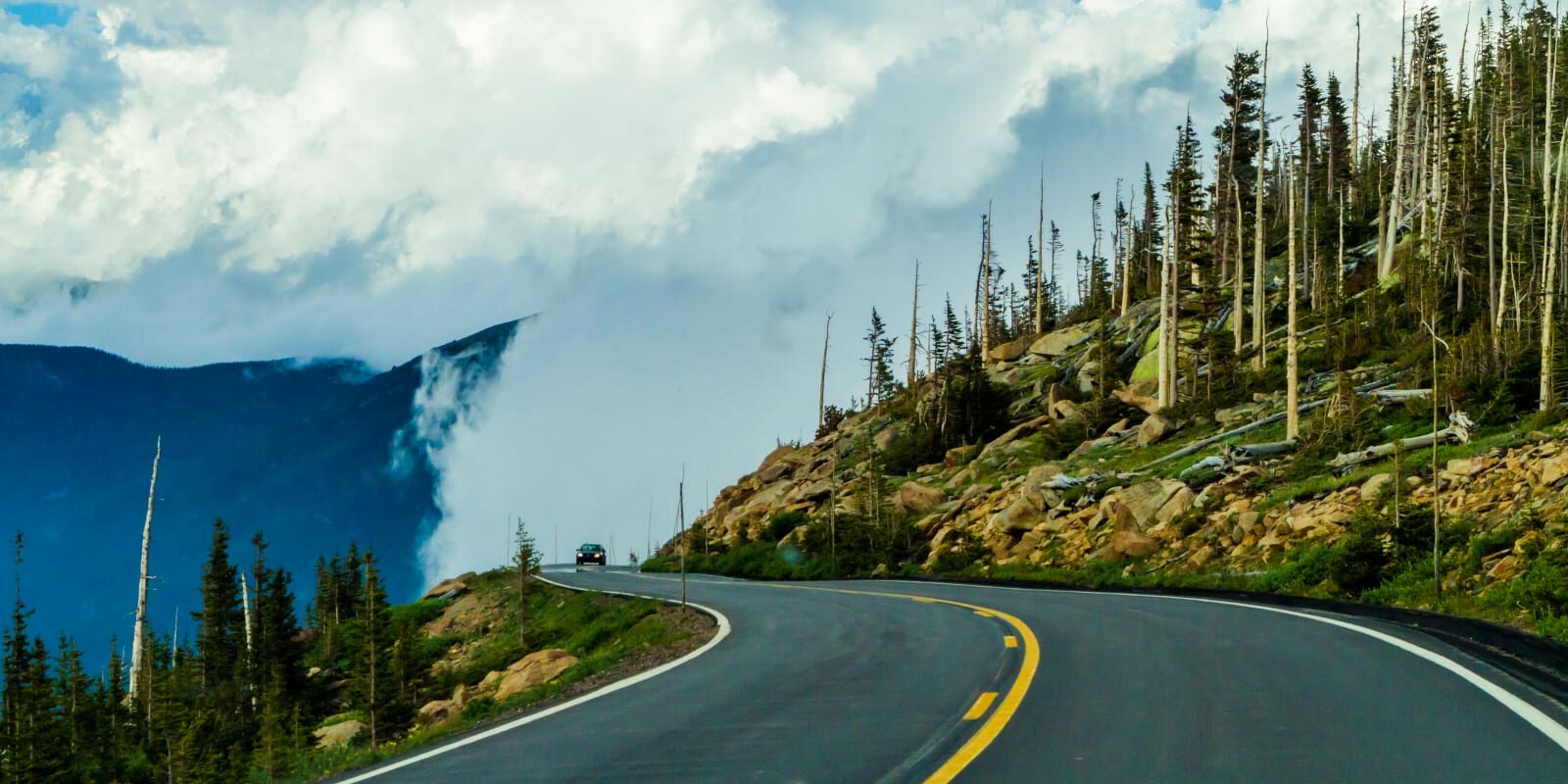 Distracted Driving Colorado Mountain Road Clouds