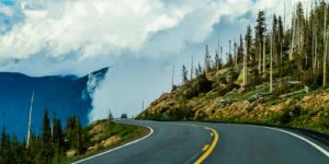 Distracted Driving Colorado Mountain Road Clouds