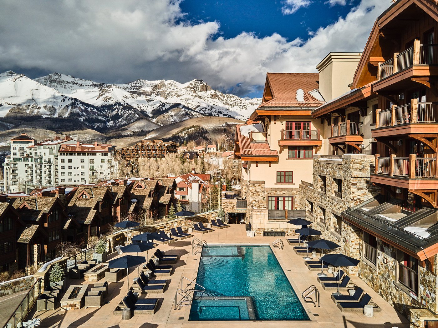 mountain views and pool at madeline hotel in telluride