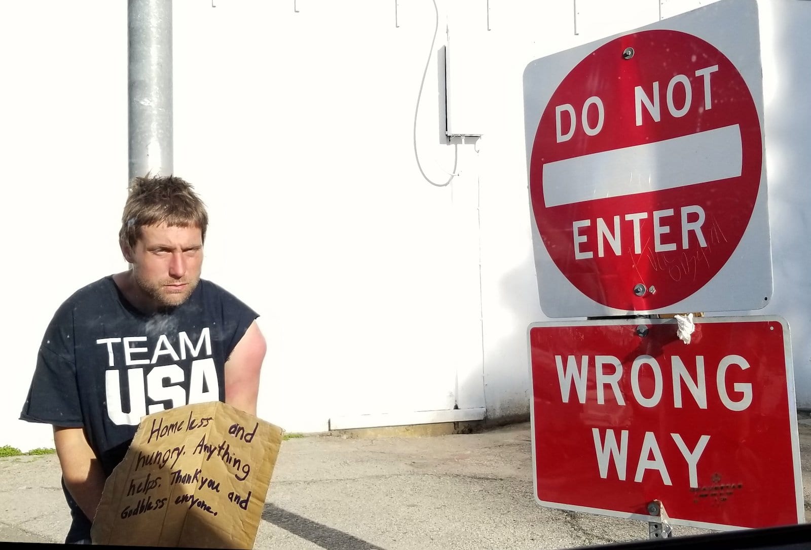 Opioid Abuse Crisis Homeless Man Dog Not Enter Sign