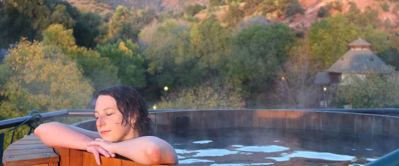 SunWater Spa Hot Springs Pool Manitou Springs Colorado Woman Soaking