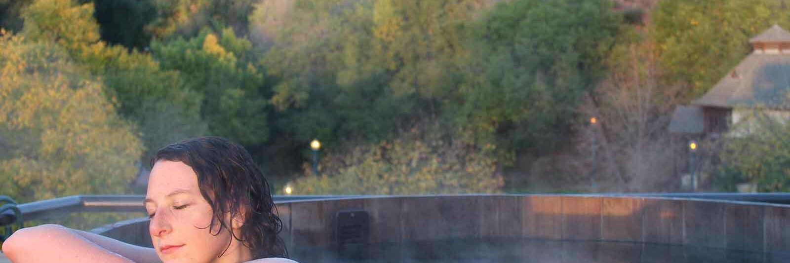 SunWater Spa Hot Springs Pool Manitou Springs Colorado Woman Soaking