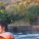 SunWater Spa Hot Springs Pool Manitou Springs Colorado Woman Soaking