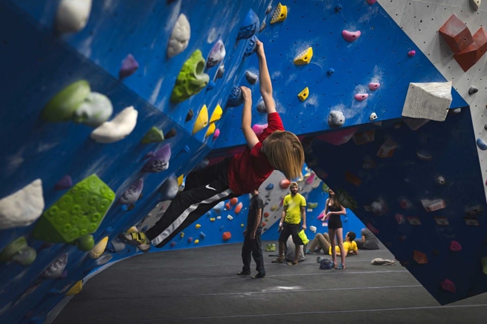 image of child bouldering