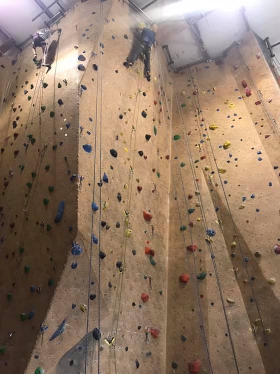 image of person on climbing wall