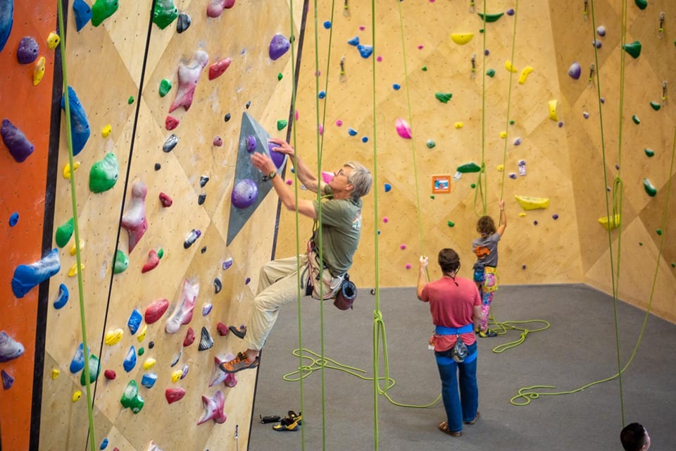 image of woman climbing