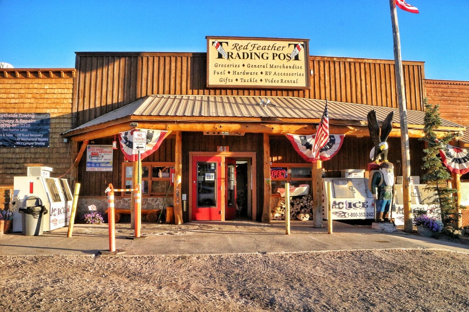 image of red feathers trading post