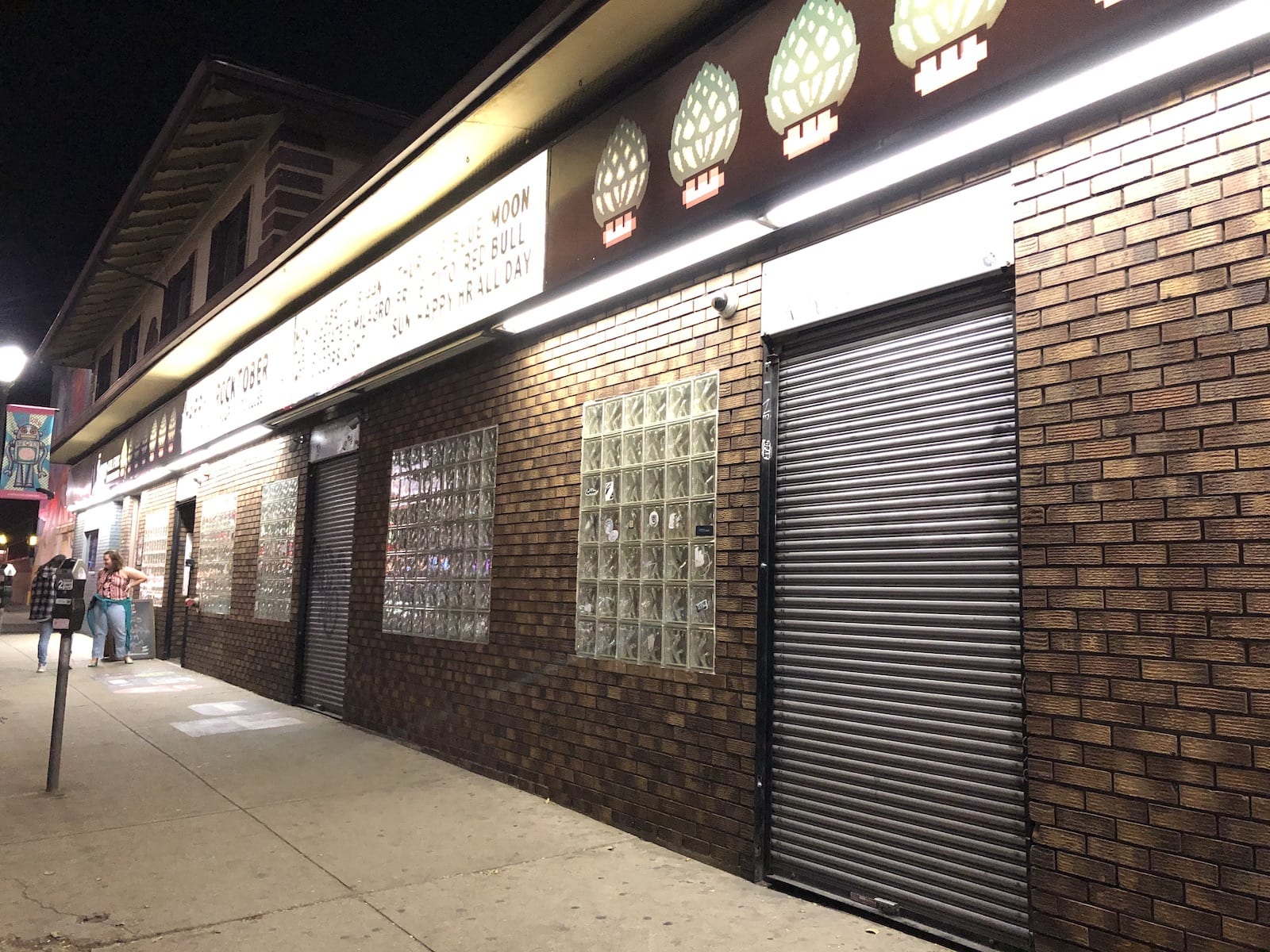 Exterior of the 1Up Bar on East Colfax at night