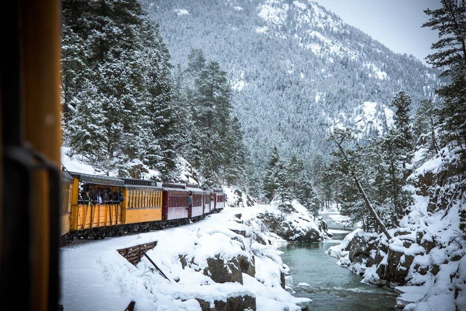 image of train through the snow in Colorado