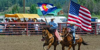 USA and Colorado Flags Pagosa Springs Rodeo