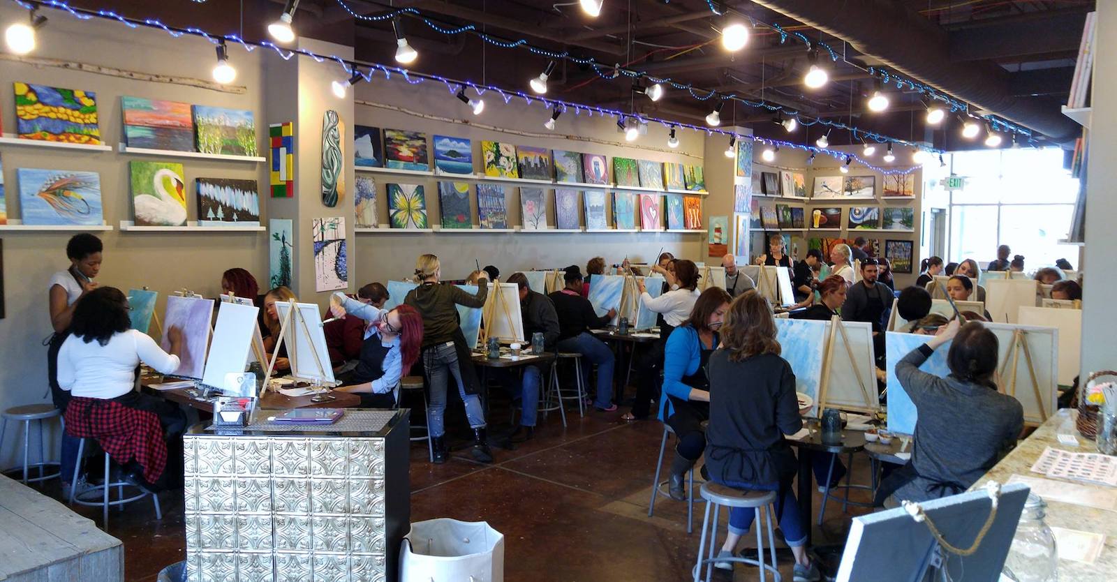 Image of people painting at Sipping N' Painting in Colorado