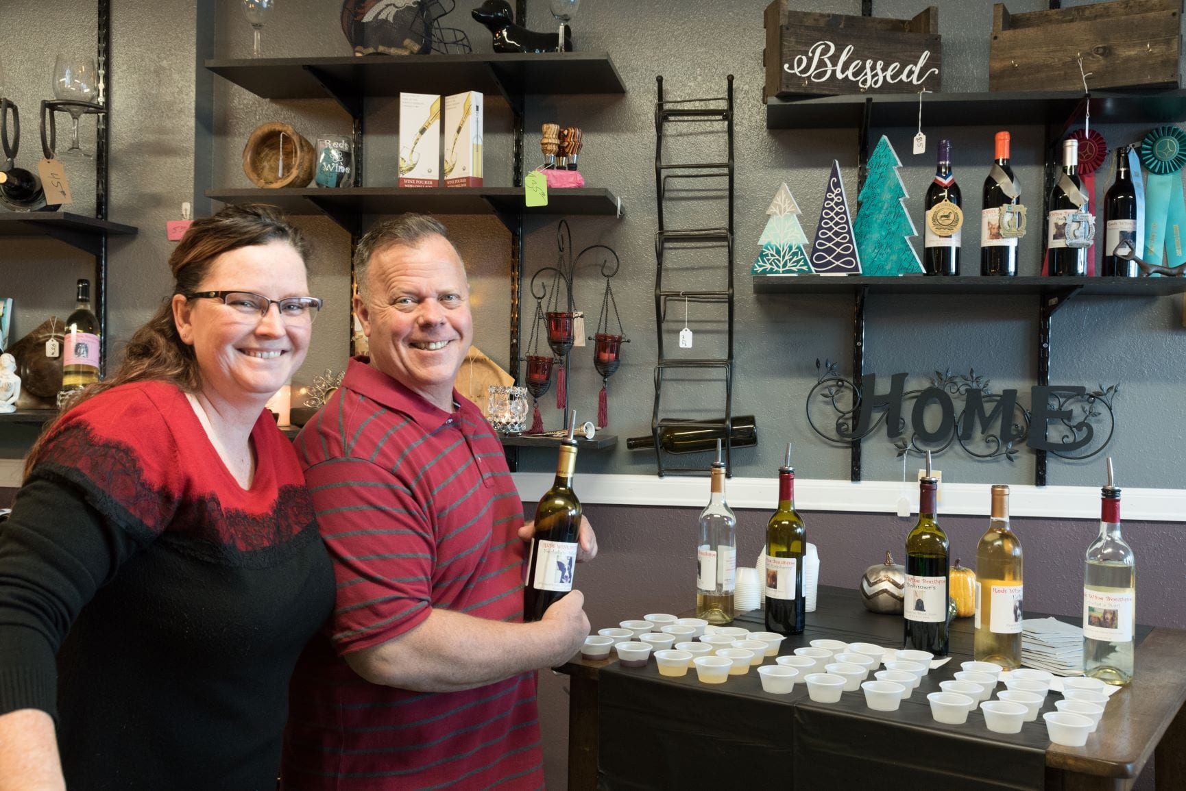 owners at reds wine boutique
