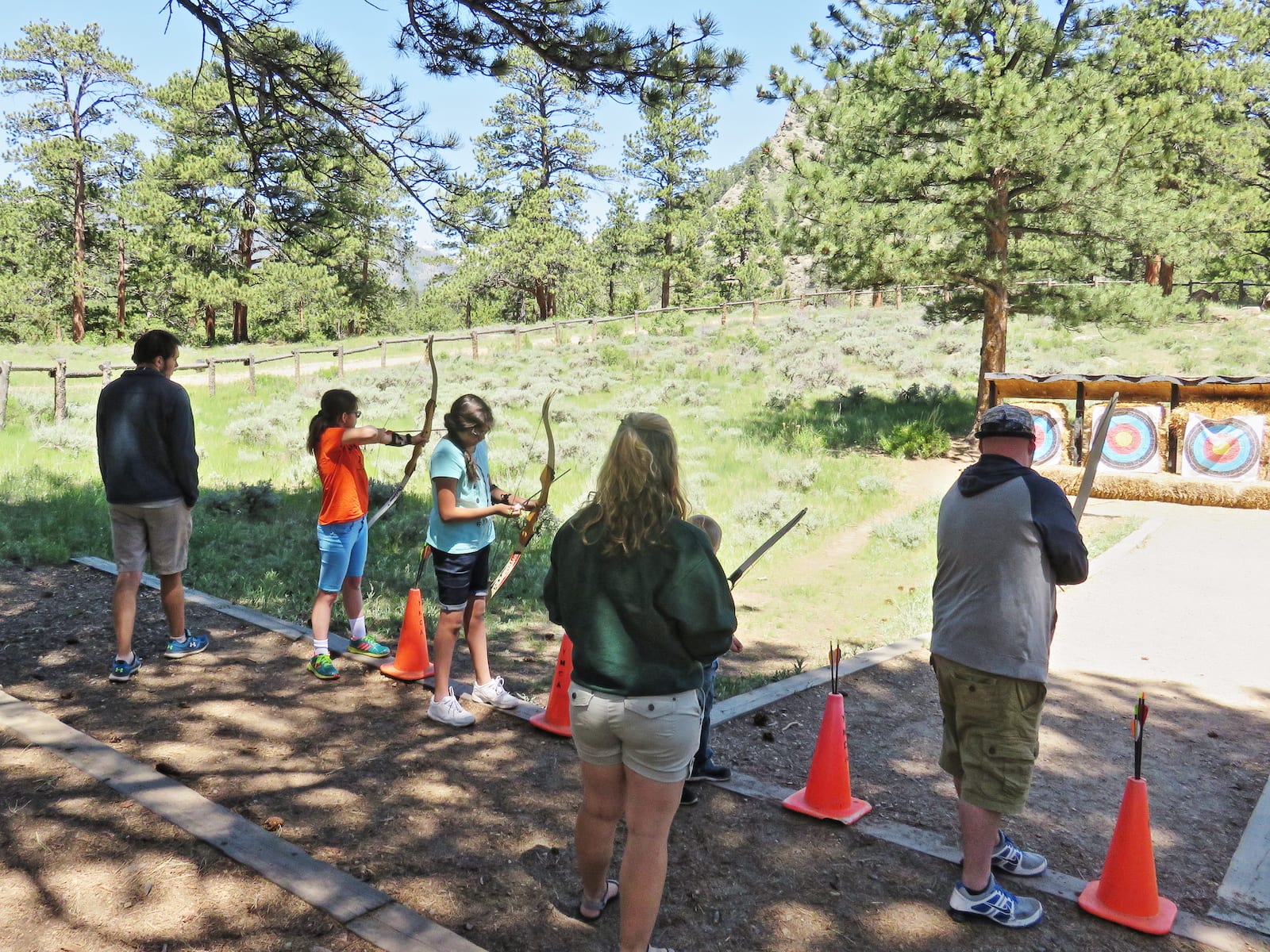 Shooting archery at YMCA of the Rockies, CO