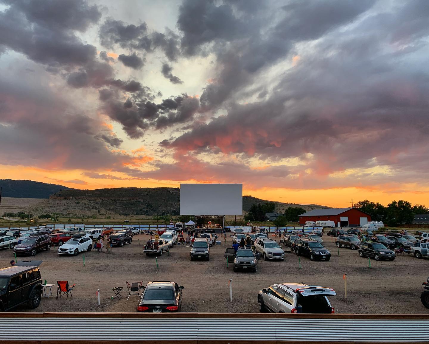 Image of the sun setting at the Holiday Twin Drive-In in Fort Collins, Colorado