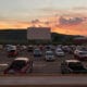 Image of the sun setting at the Holiday Twin Drive-In in Fort Collins, Colorado