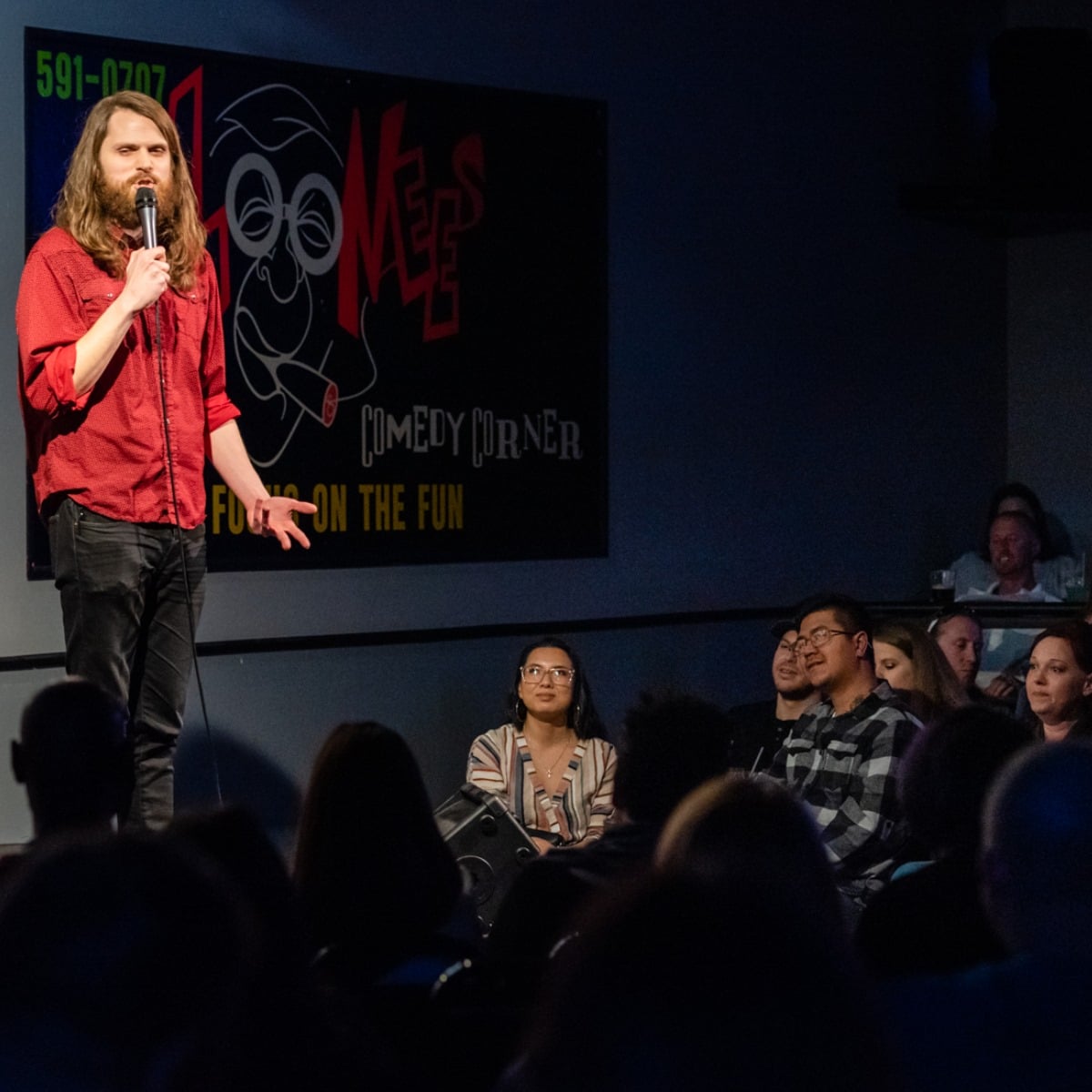 Image of a comedian at Loonees Comedy Corner in Colorado Springs, Colorado