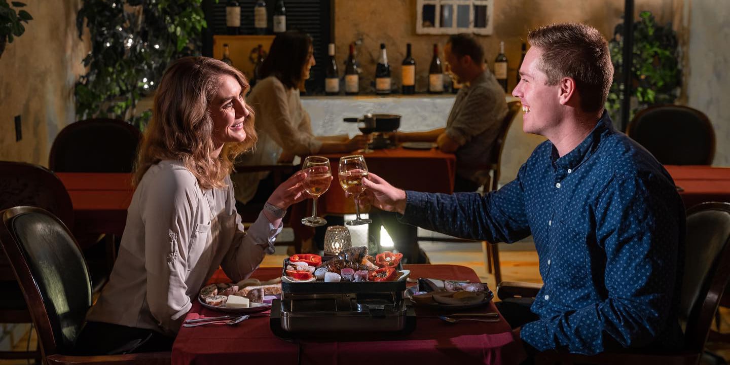 Image of people enjoying a meal at Mona Lisa Fondue Restaurant in Colorado Springs, Colorado