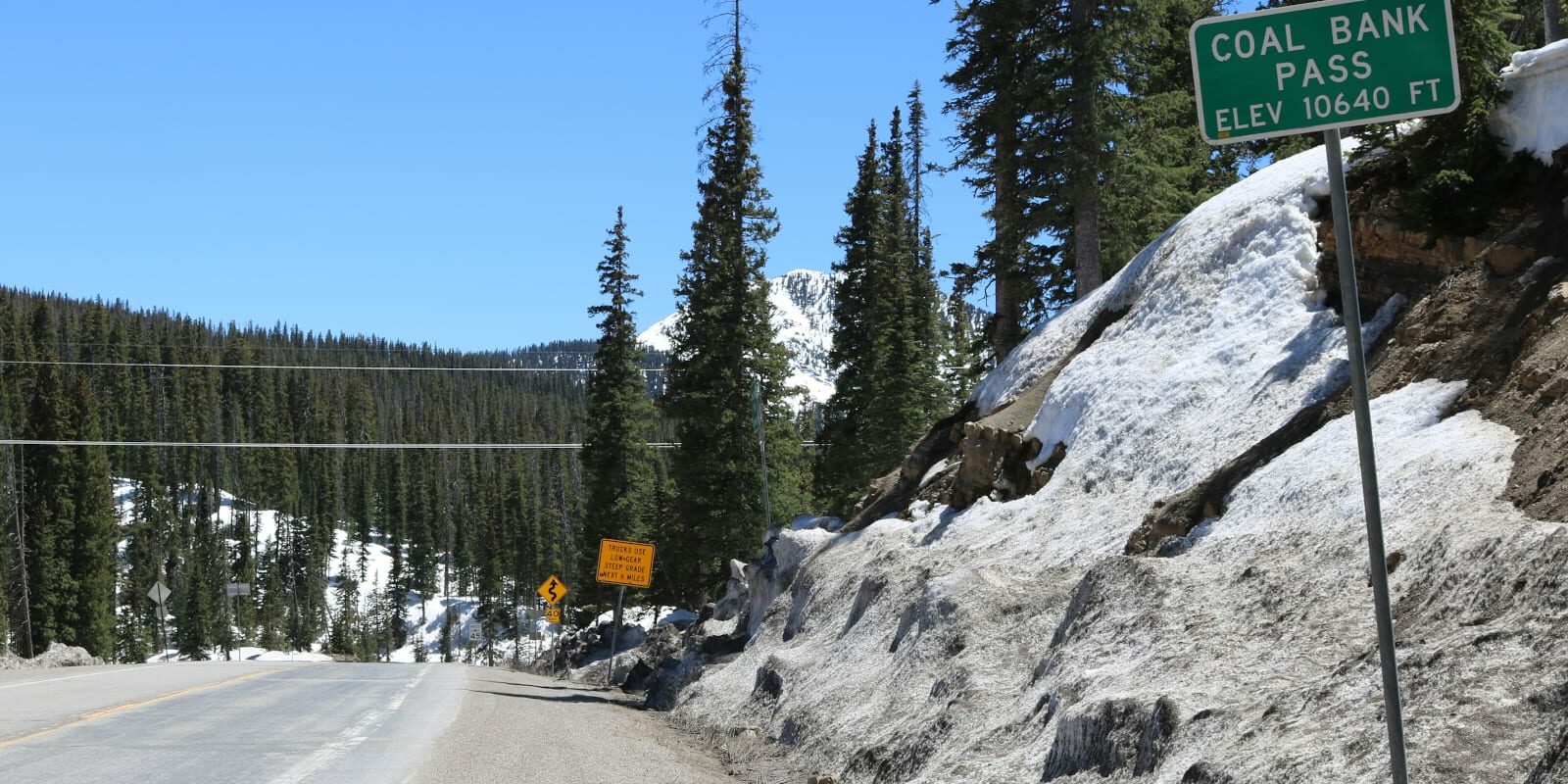 One of the signs at the top of Coal Bank Pass in San Juan County, Colorado