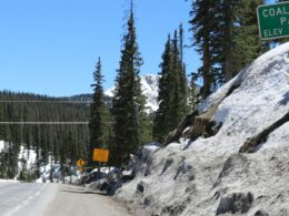 One of the signs at the top of Coal Bank Pass in San Juan County, Colorado