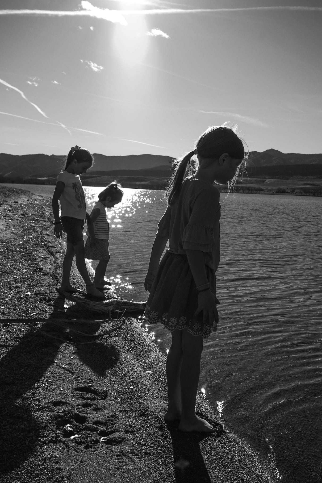 Granddaughters on shore of Chatfield Reservoir Littleton Colorado