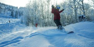 image of Powderhorn Resort Snowboarding through Powder