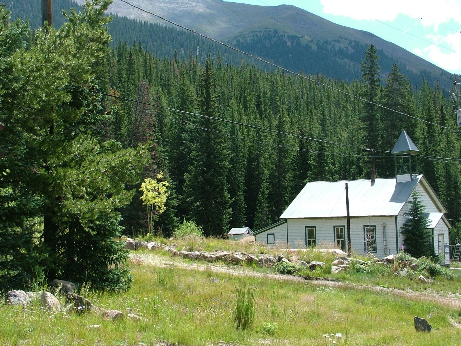 Image of an abandoned school house in the ghost town of Montezuma in Colorado