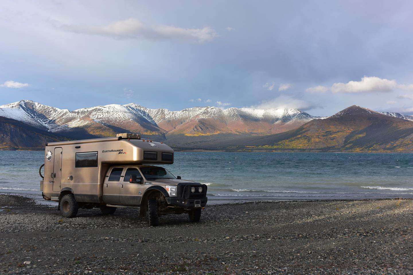 Image of the EarthRoamer XV-LT with Colorado's mountains in the background