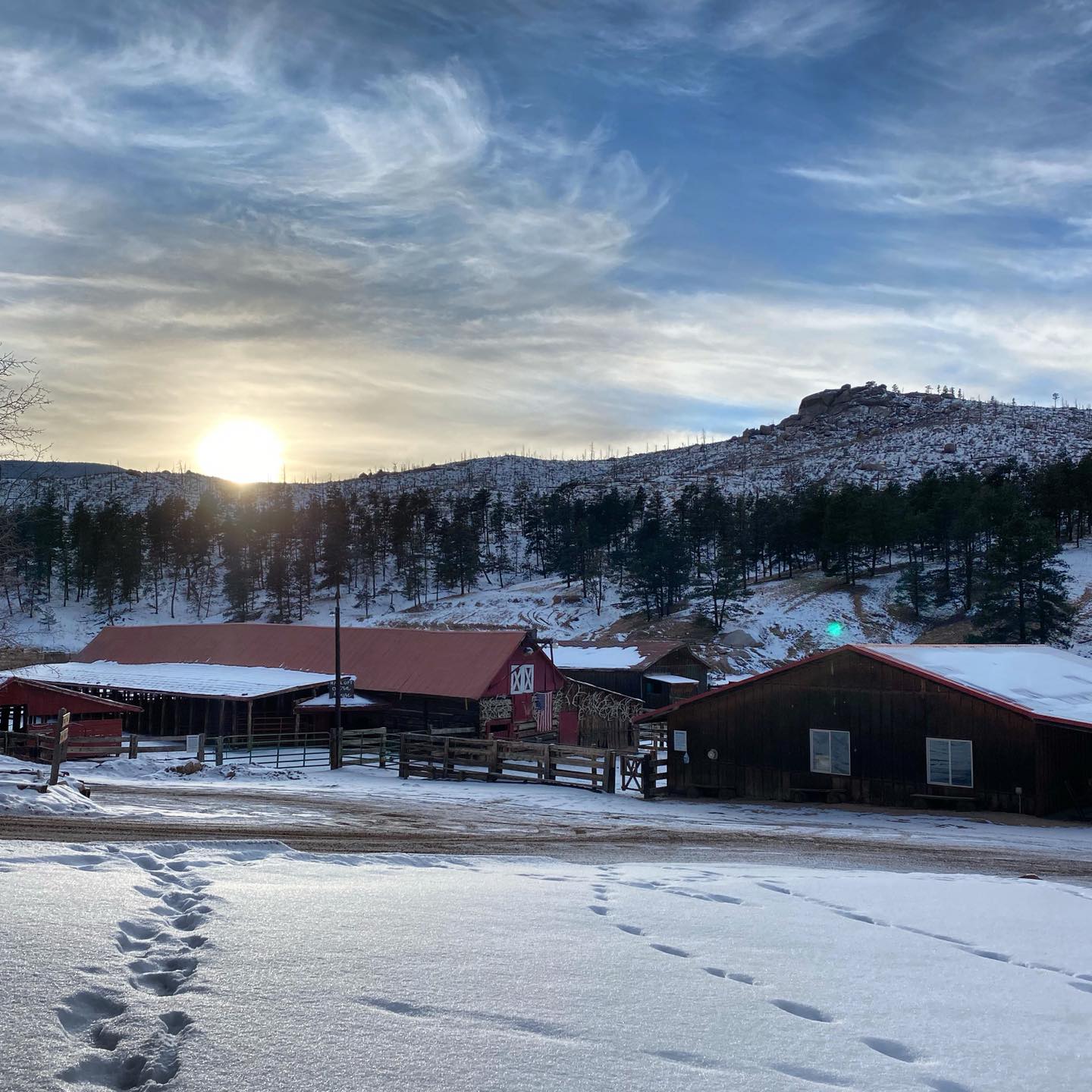 Image of the sun setting at lost valley ranch, colorado 