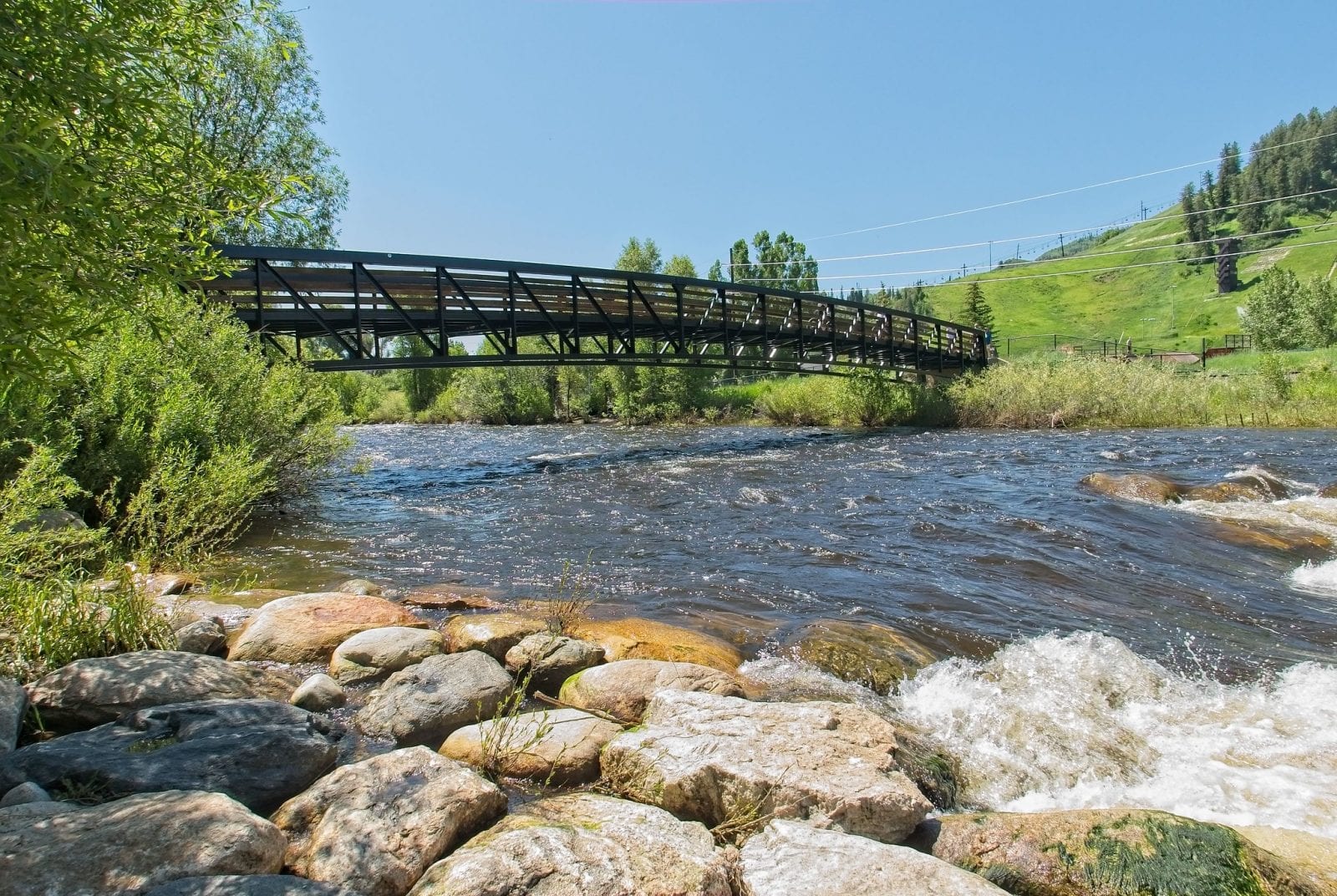 Image of a bridge going across the Yampa River near Steamboat Springs