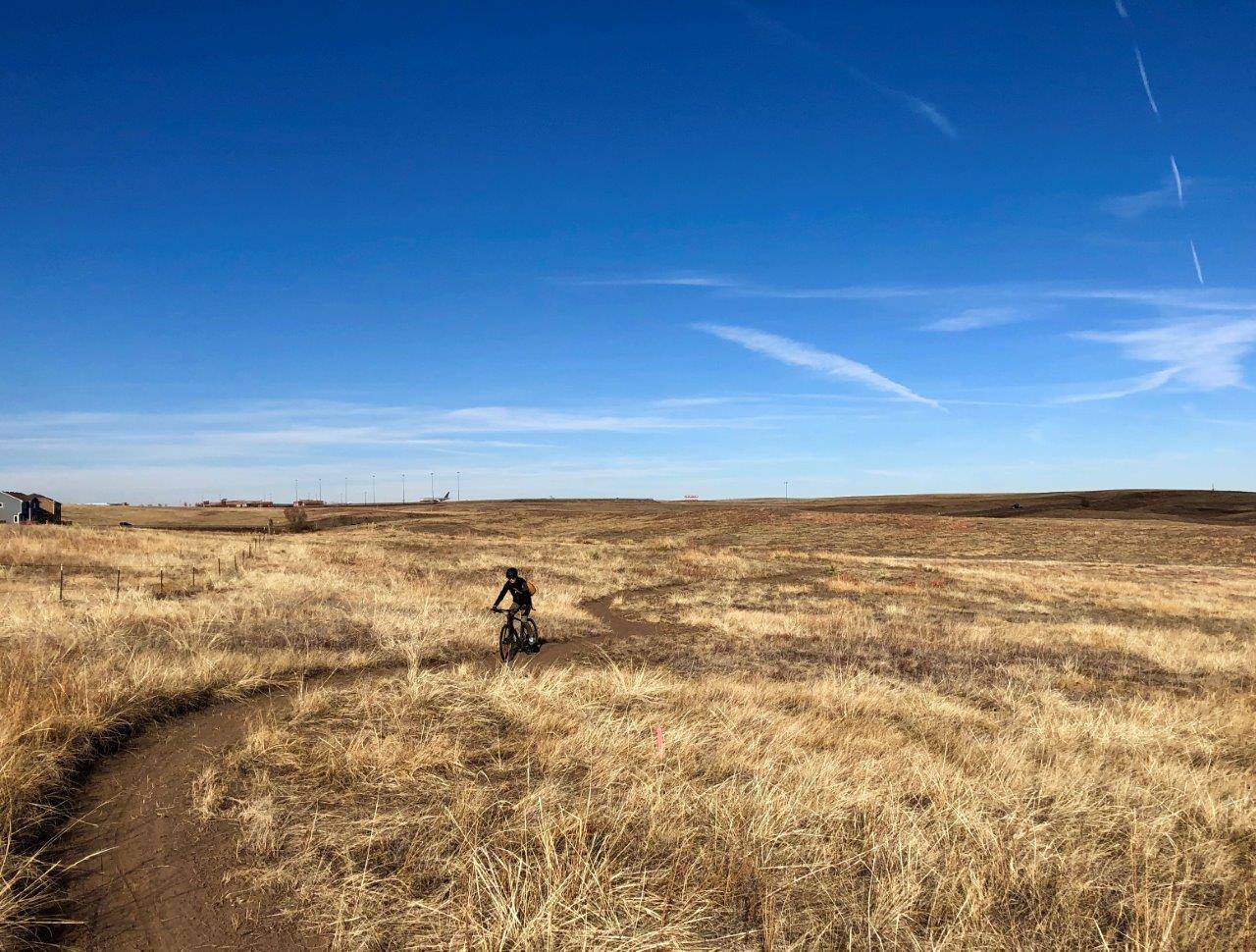 Image of a biker at the Bluestem Prairie Open Space in Colorado Springs, Colorado