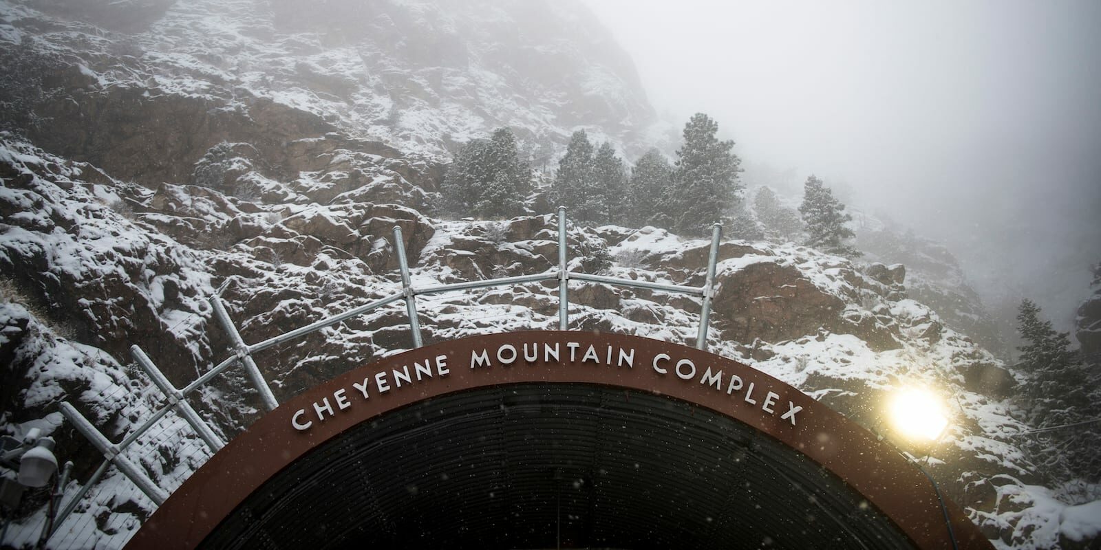 Image of the Cheyenne Mountain Complex Sign in Colorado Springs, Colorado during winter