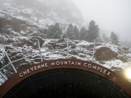 Image of the Cheyenne Mountain Complex Sign in Colorado Springs, Colorado during winter