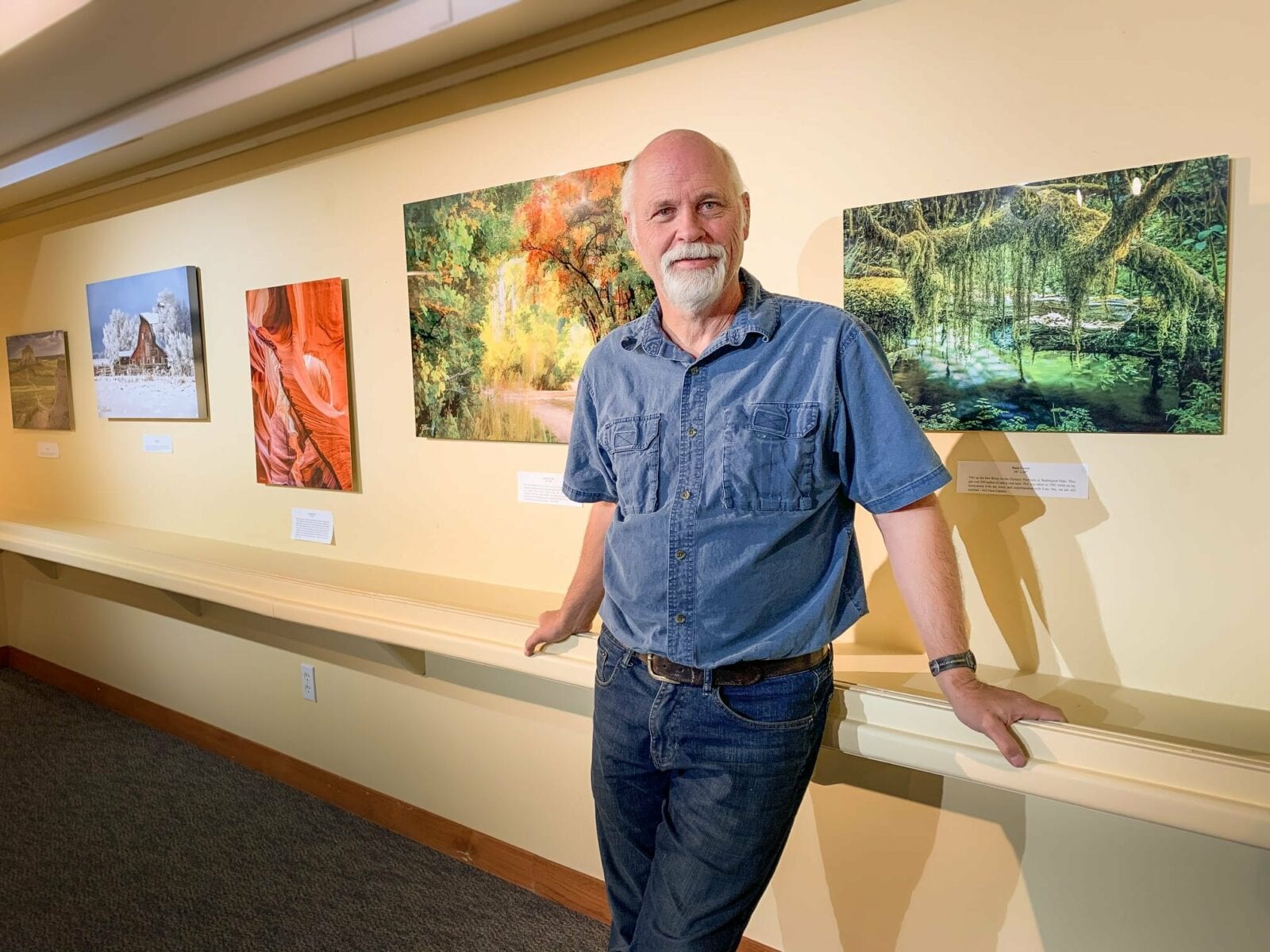 Image of a man in a painting gallery within the Fort Morgan Public Library & Museum in Colorado