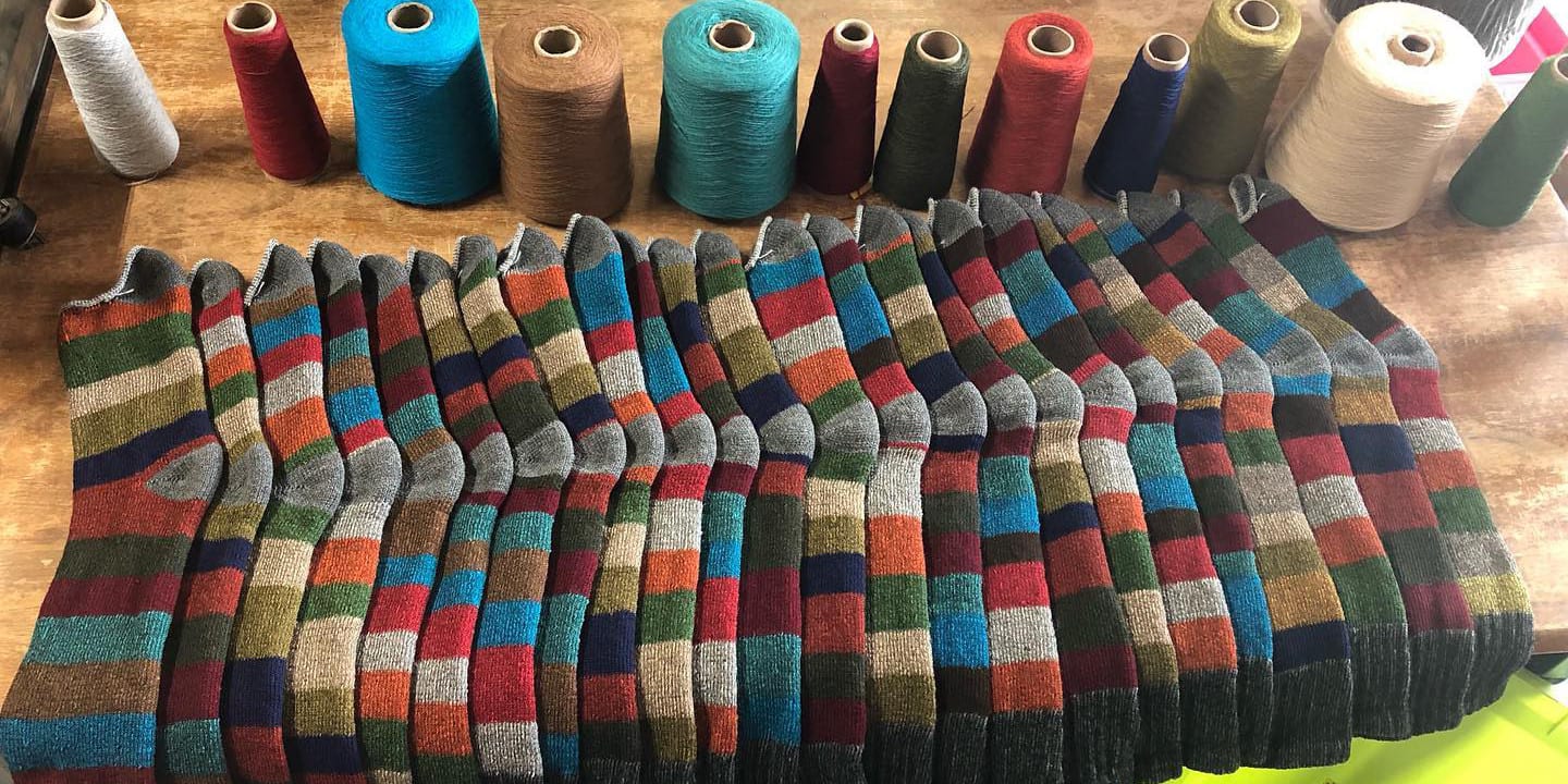 Image of socks made at Phoenix Fiber Mill in Olney Springs, Colorado