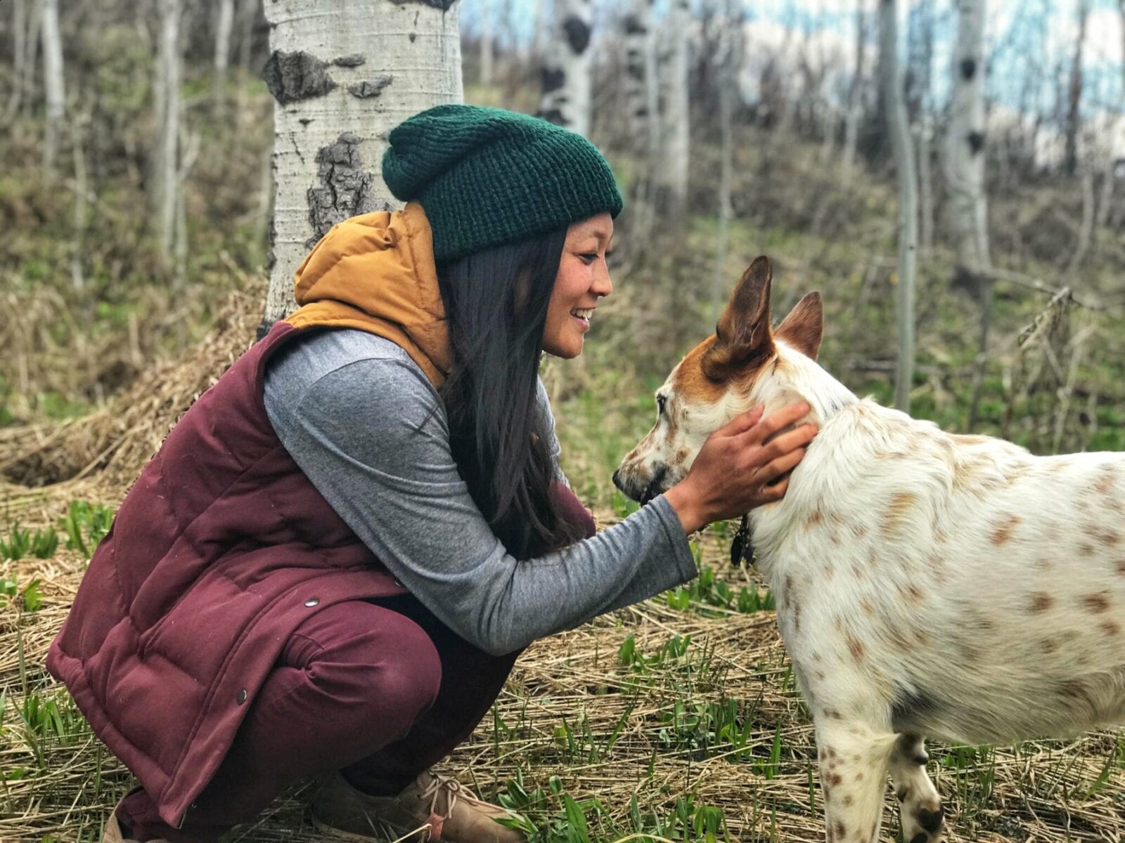 Image of the owner of Smeeny Beanie Knits, Chereen, and her dog