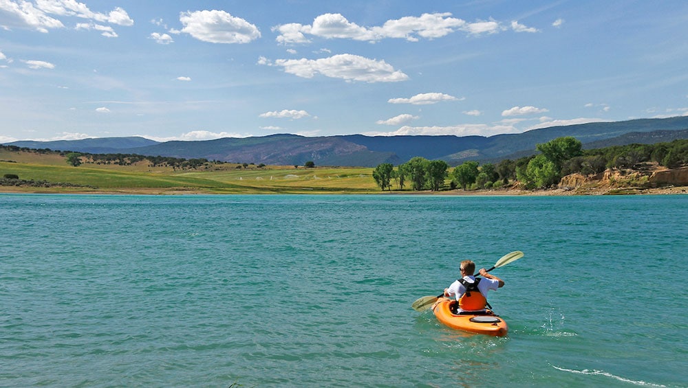 image of kayaker at harvey gap state park