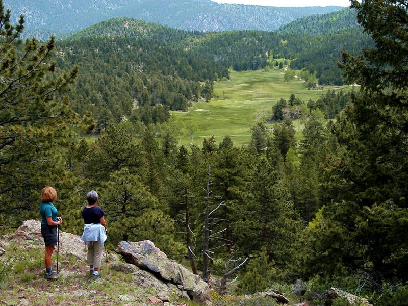 Image of two hikers at Hermit Park Open Space in Estes Park, Colorado