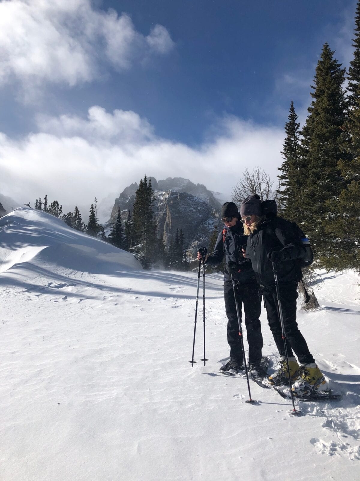 Image of people snowshoeing at at Kent Mountain Adventure Center in Estes Park, Colorado