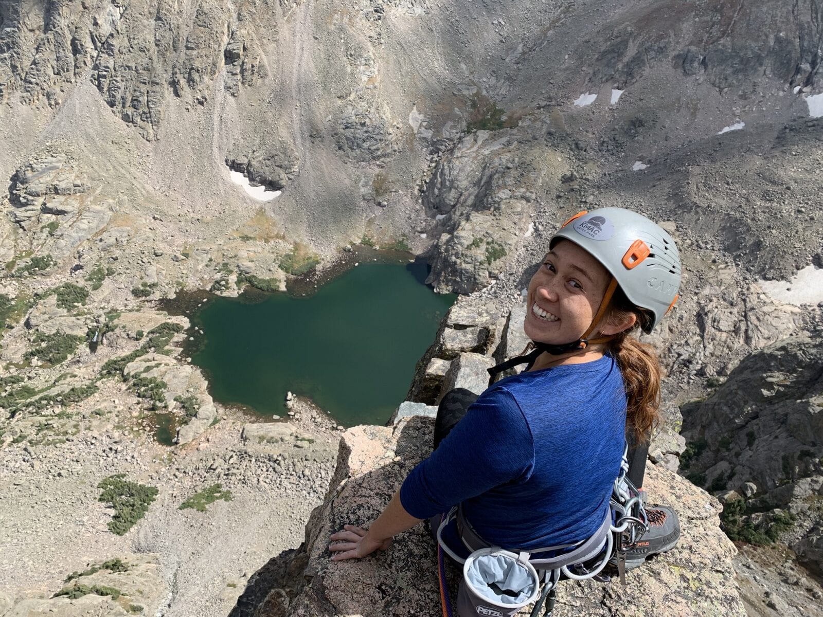 Image of a woman on the Via Ferrata at at Kent Mountain Adventure Center in Estes Park, Colorado