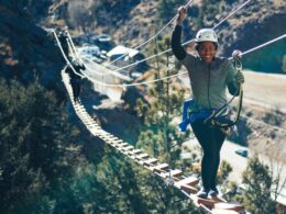 Image of a woman on a bridge on the Mount Evans Via Ferrata in Idaho Springs, Colorado