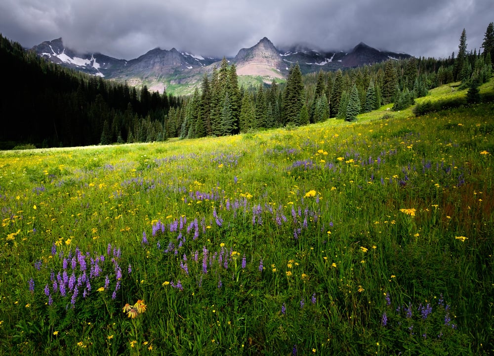 Image of dark clouds over the mountains at Oh Be Joyful Recreation Area and Campground in Crested Butte, Colorado