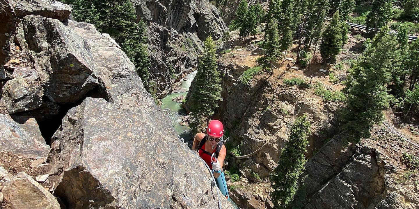 Image of a woman climbing the Ouray Via Ferrata in Colorado