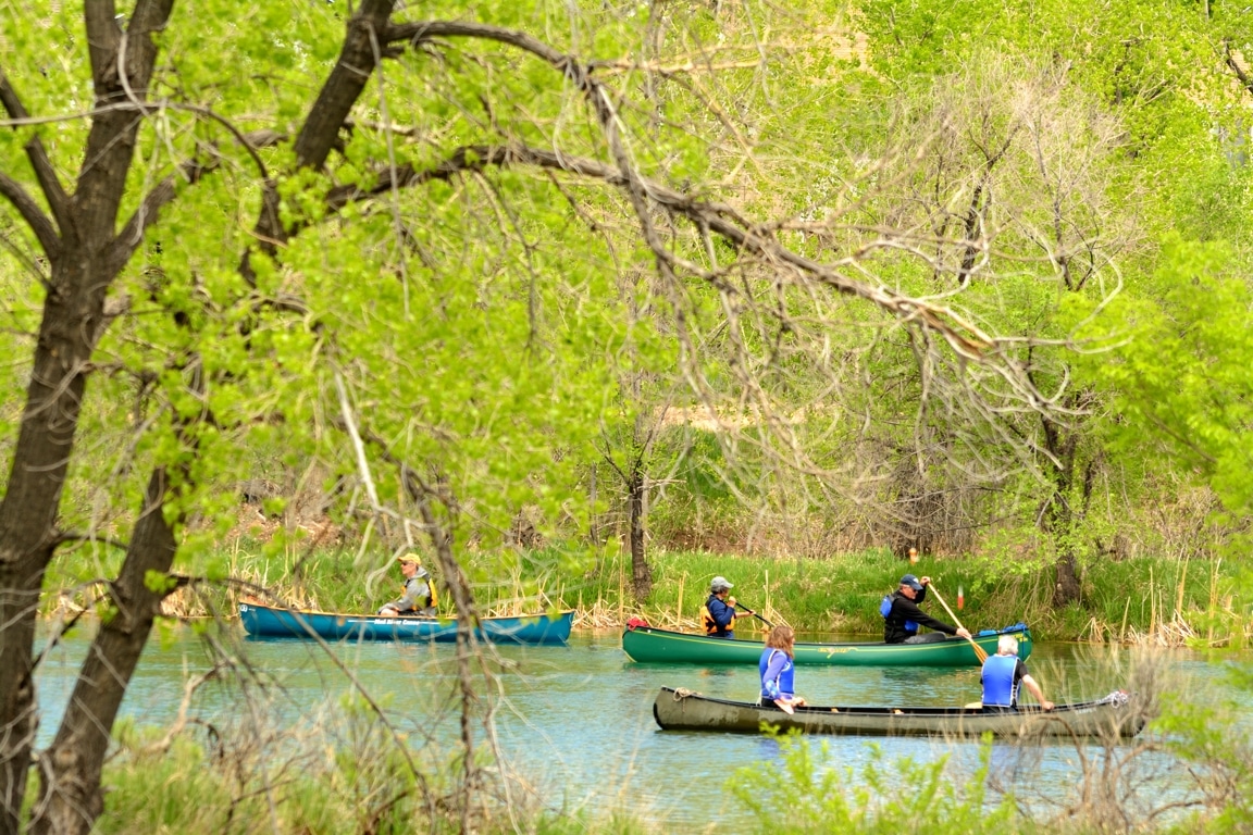 Image of people on canoes at at Riverbend Ponds Natural Area in Fort Collins, Colorado