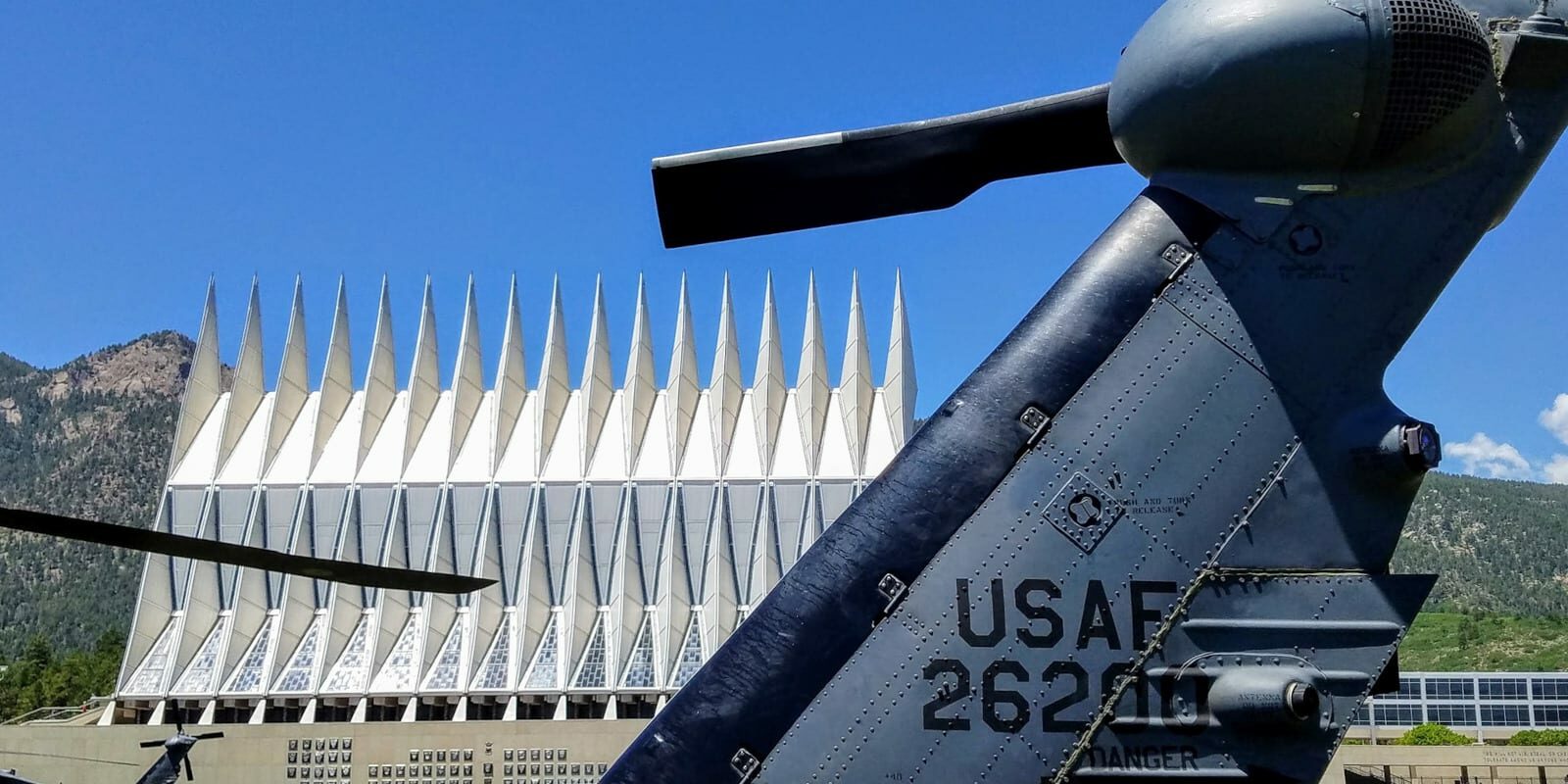 Image of a helicopter in front of the US Air Force Cadet Chapel in Colorado Springs, Colorado