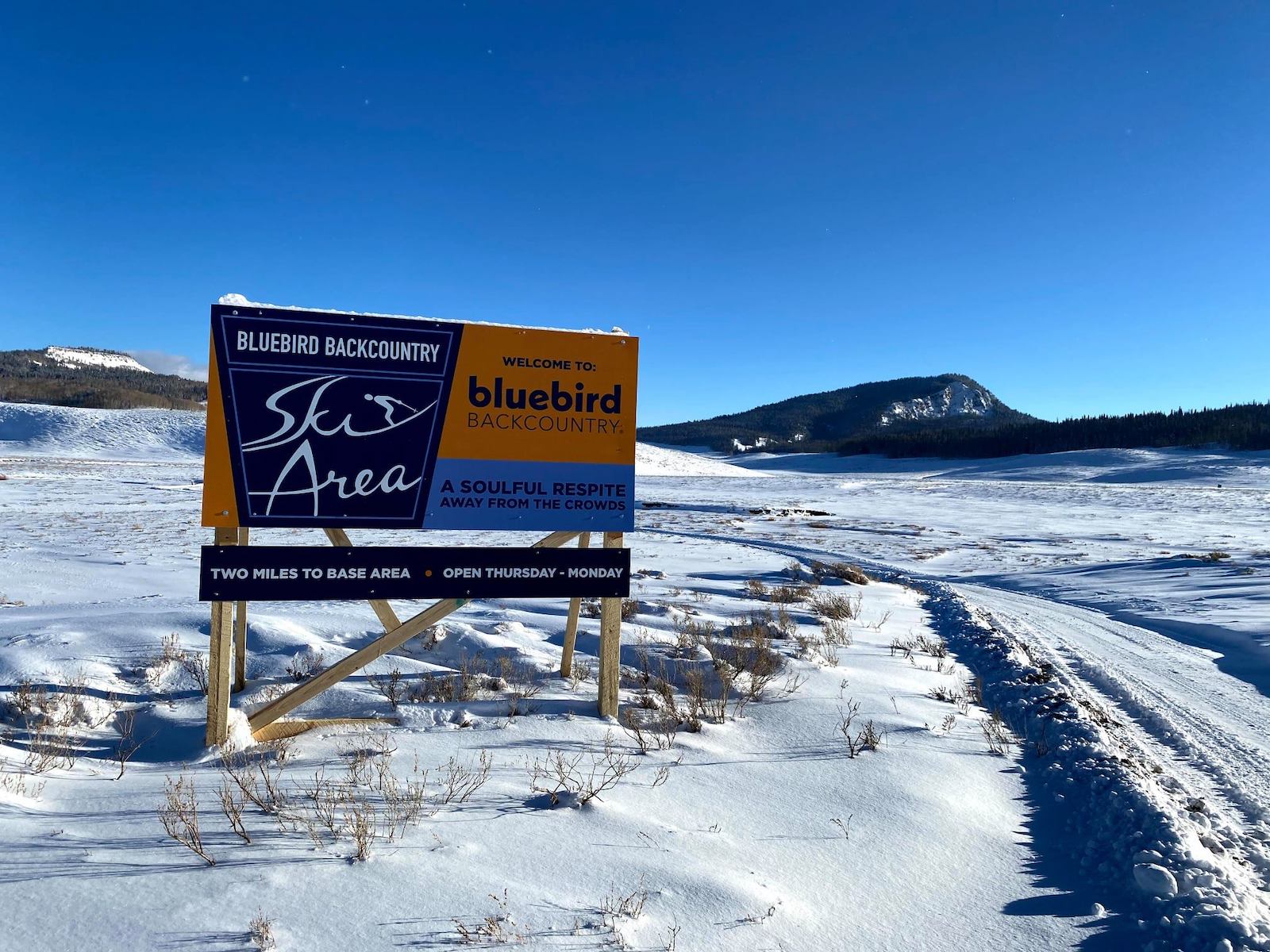 Image of the sign for Bluebird Backcountry in Colorado